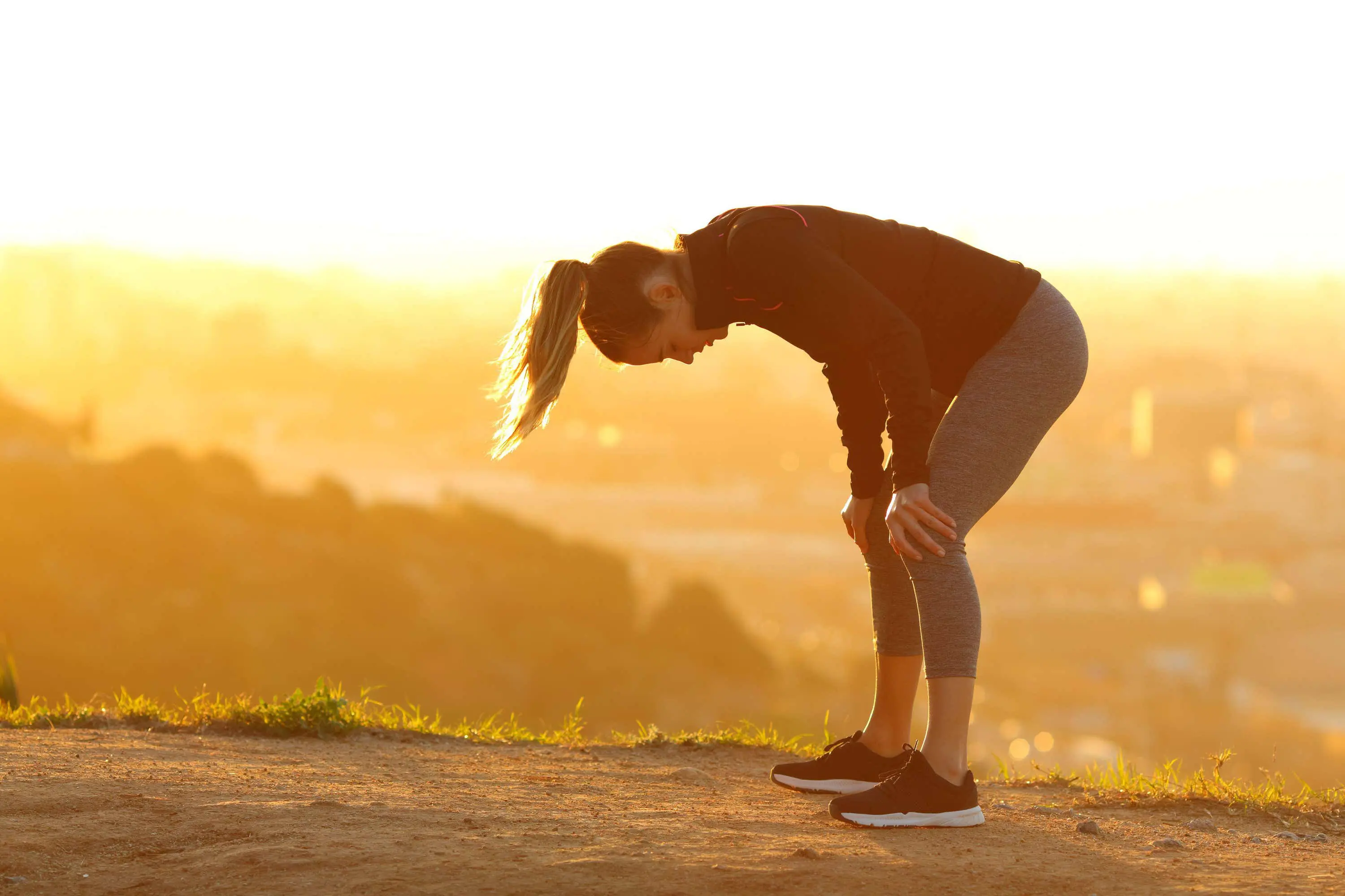 Woman out of breath whilst exercising scaled