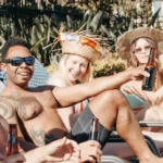 young people sunbathe scaled