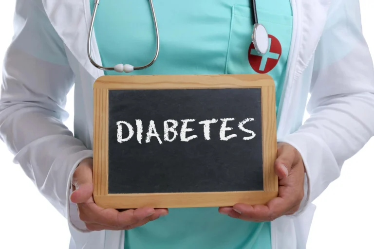 doctor holds diabetes chalk board scaled