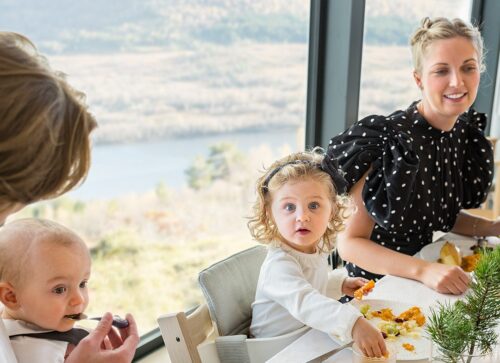 family enjoying mealtime e1621333494900