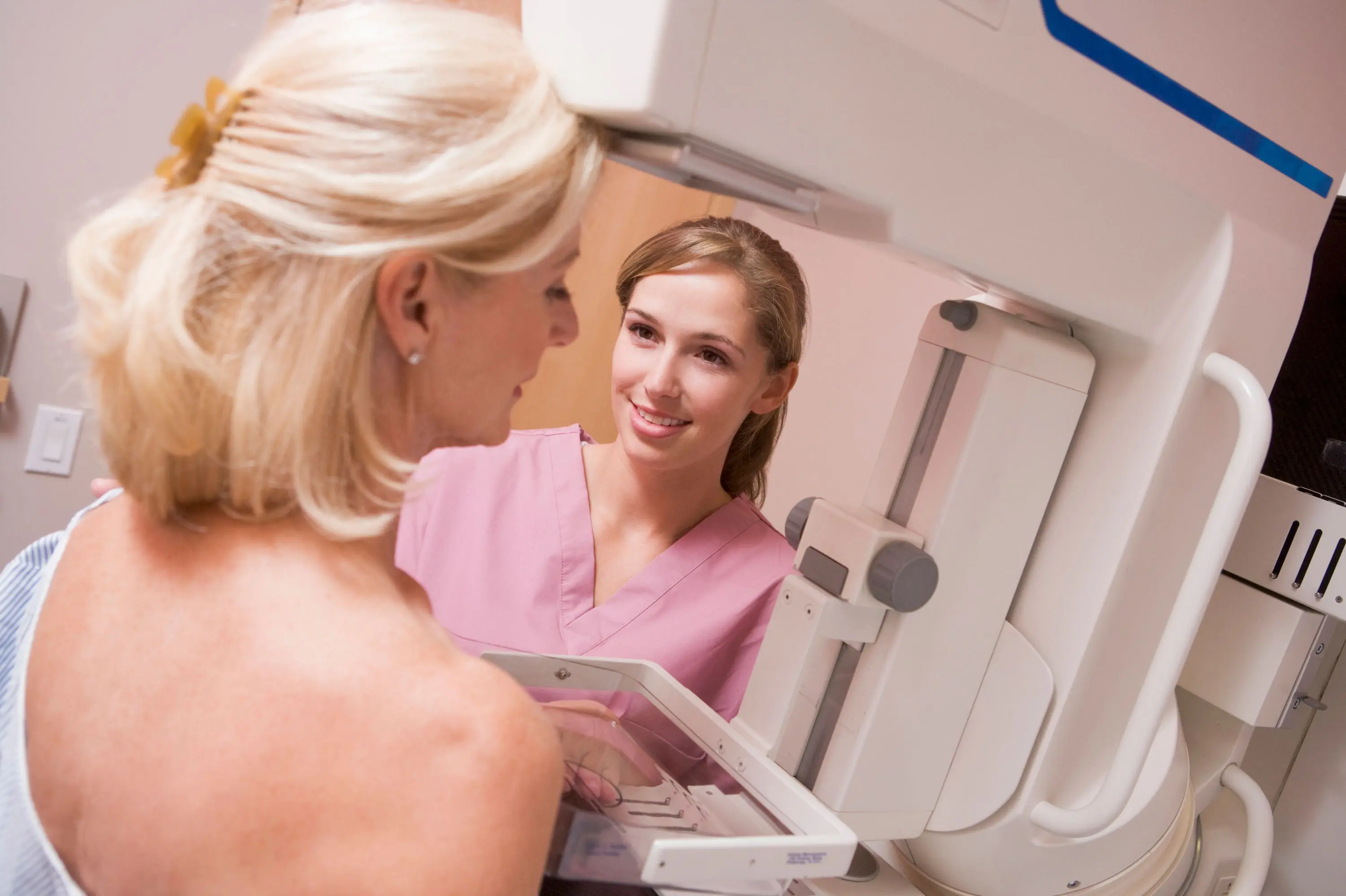 Woman attends breast cancer screening scaled