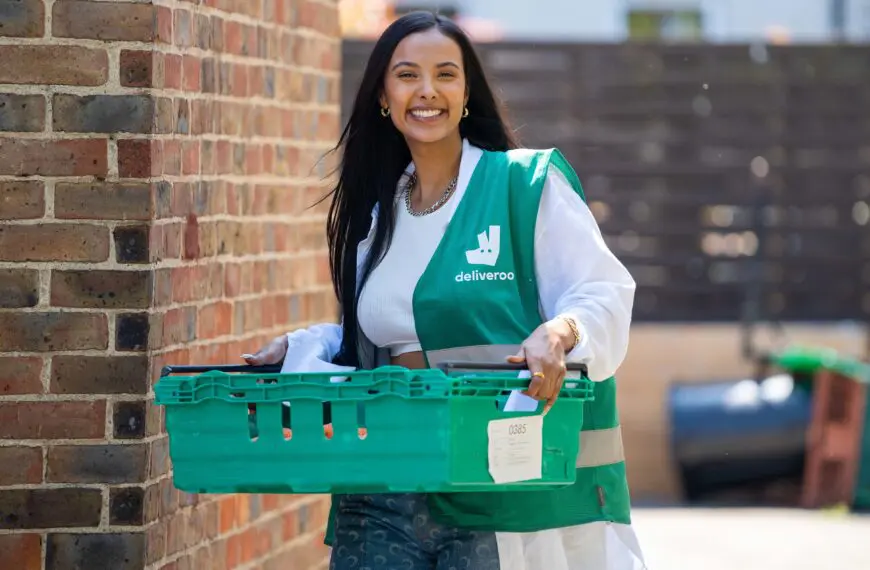 TV star Maya Jama surprises youths in Hackney East London to volunteer as part of Deliveroos Full Life campaign delivering 1m meals to people in the local communities scaled