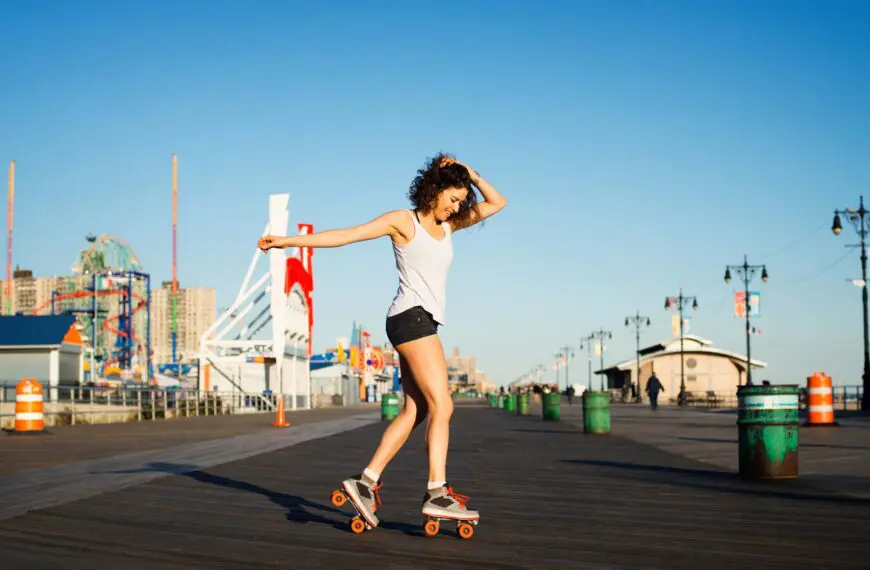 girl rollerskates on pathway scaled