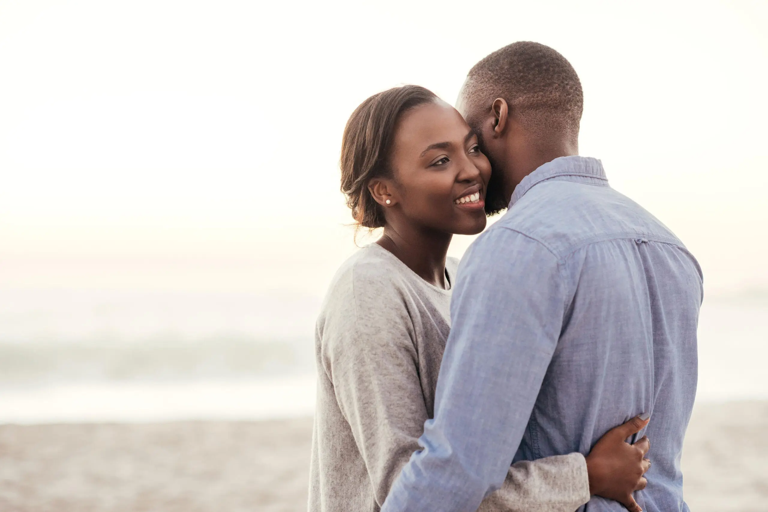 Man and woman hug scaled