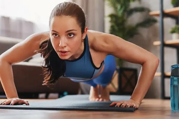 Woman holds plank