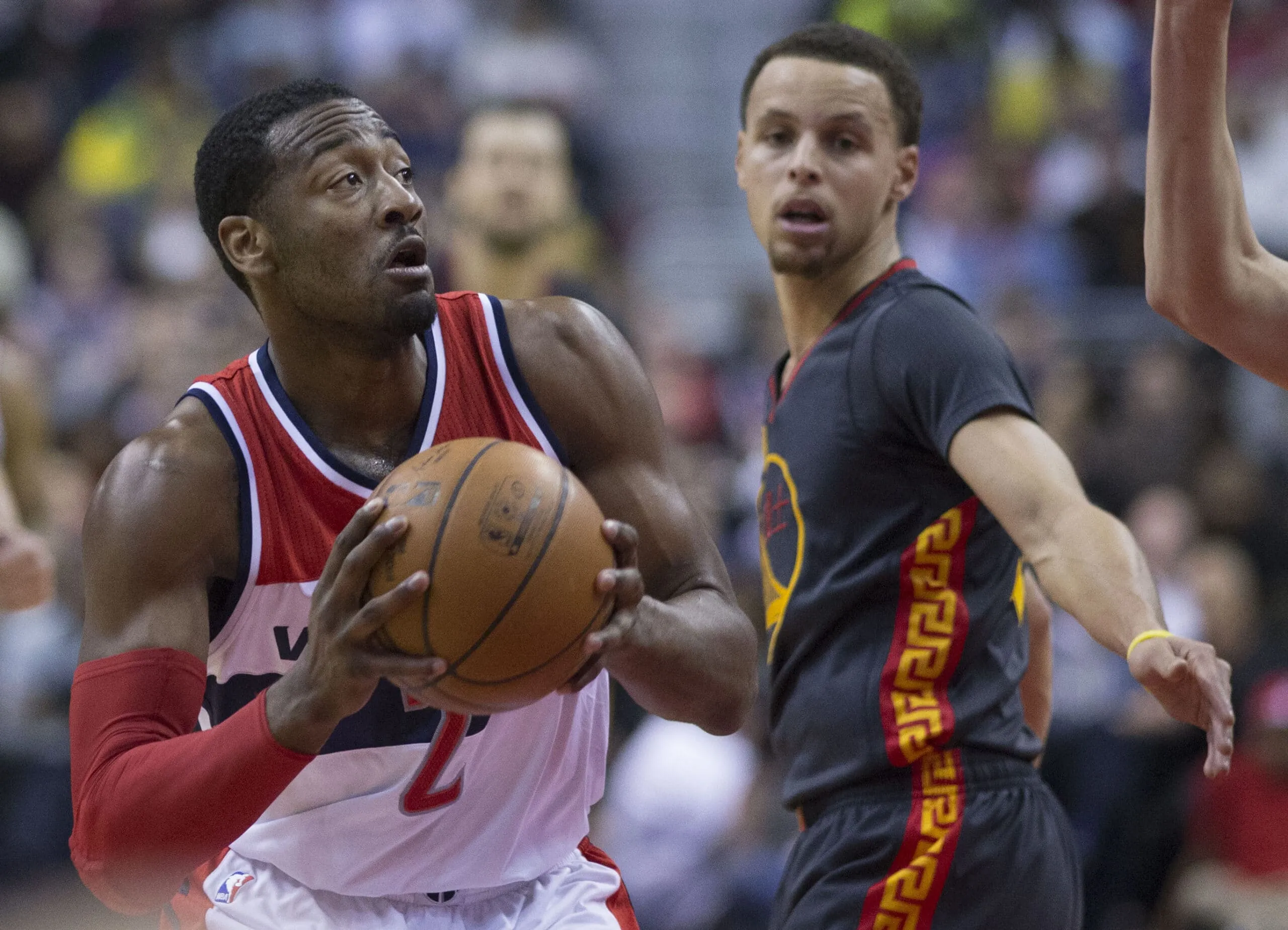 John Wall with Stephen Curry scaled