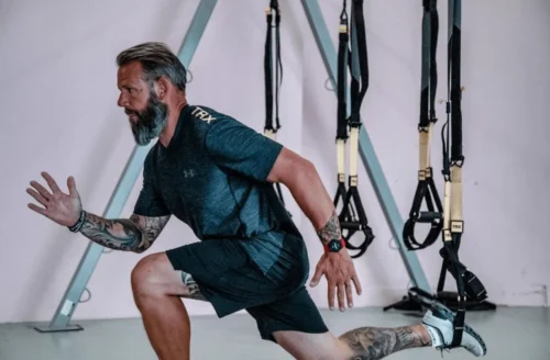 fitness goer uses trx suspension