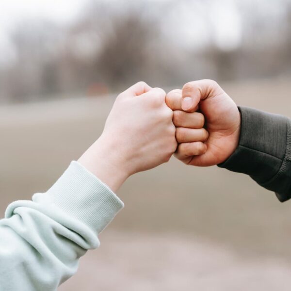 people fist bump