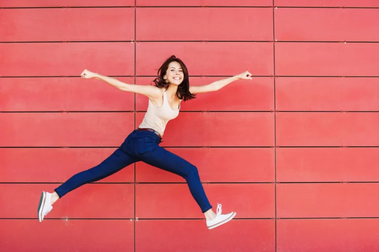 woman in long stride smiling scaled