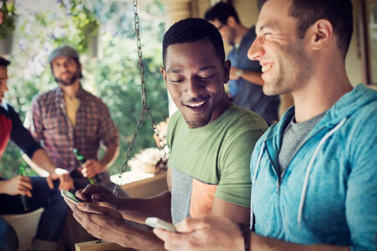 gathering of men share jokes scaled