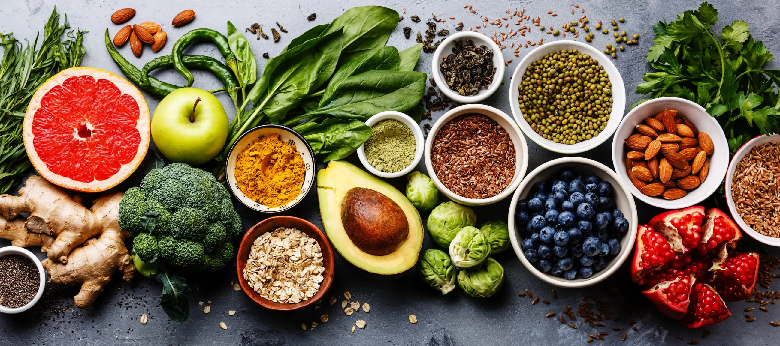 Mixture of colourful foods in bowls scaled