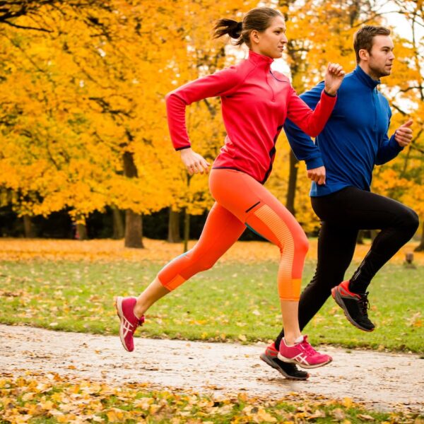 couple running in autumn