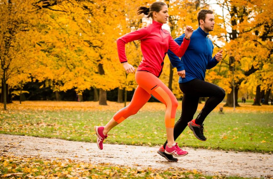 couple running in autumn