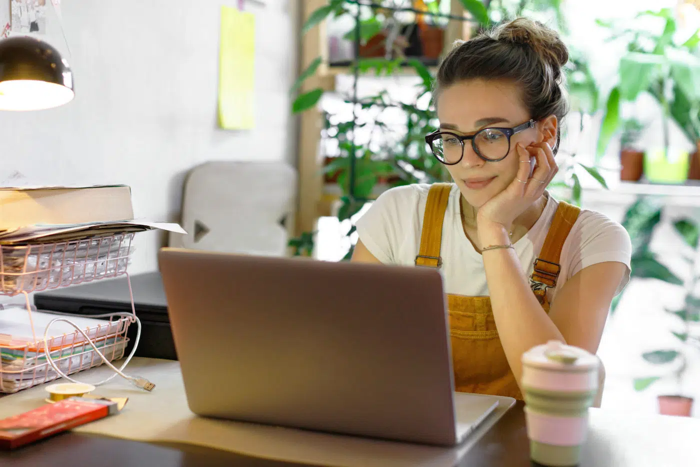 Woman works remotely from home