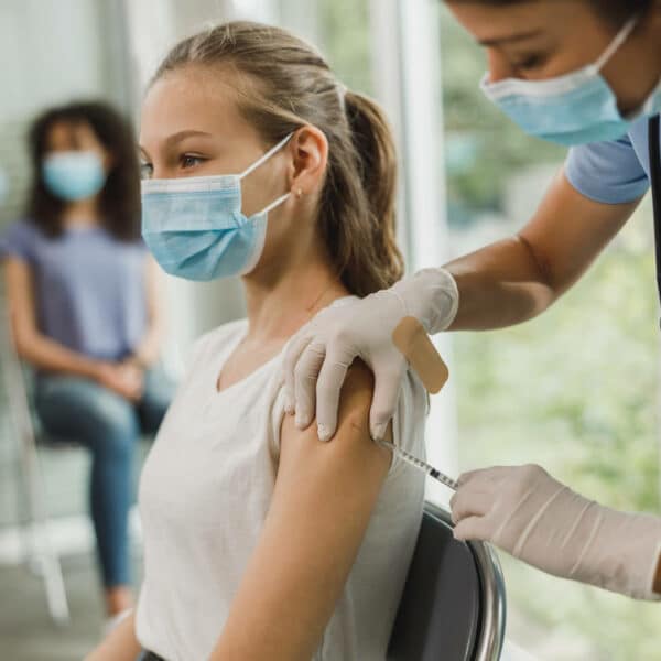 teenager having injection