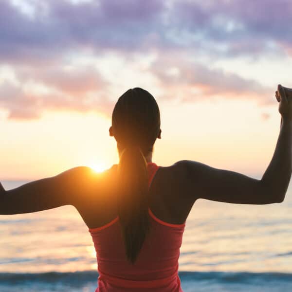 Fitness woman celebrating fitness workou