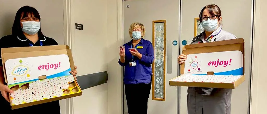 Staff on ward 225 show off the juicy new addition to the menu