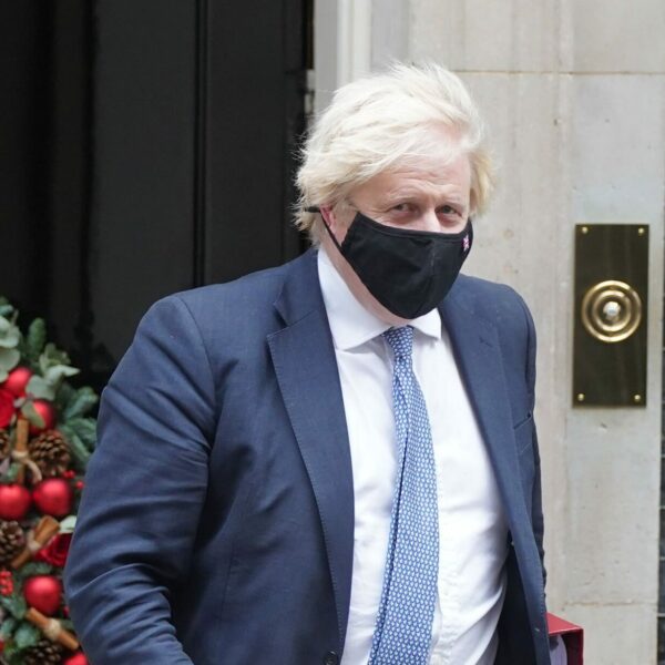 boris johnson leaving downing street scaled e1638988435692