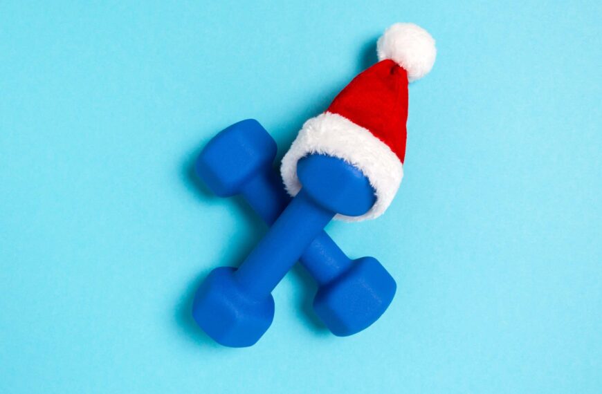 dumbbells with christmas hat on scaled