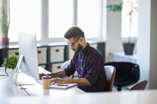 man working at computer