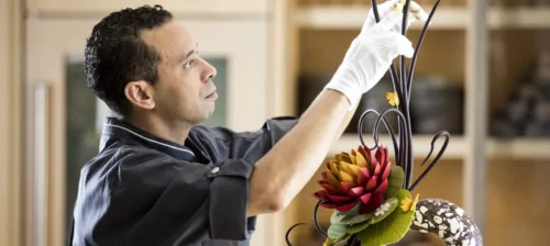 staff member at four seasons hotel orlando e1640871875266