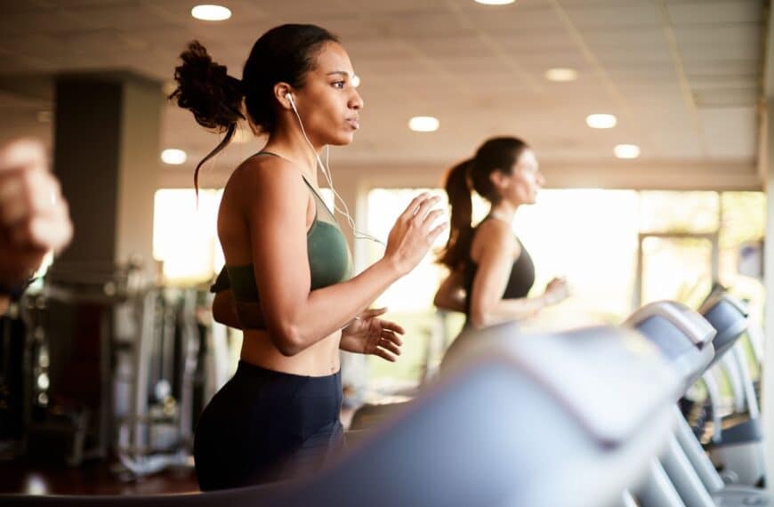 women run on treadmills