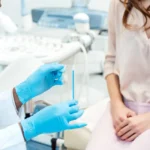 Woman seeing gynecologist doctor to check for health issue
