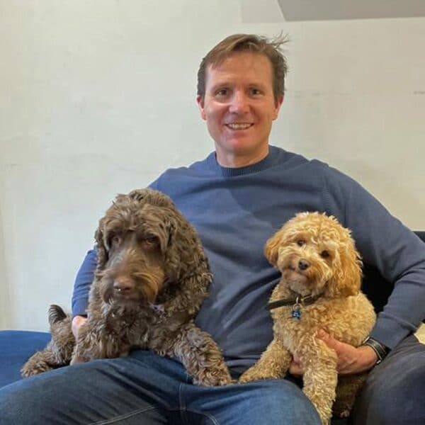 roger black at home with his dogs scaled e1643231754147