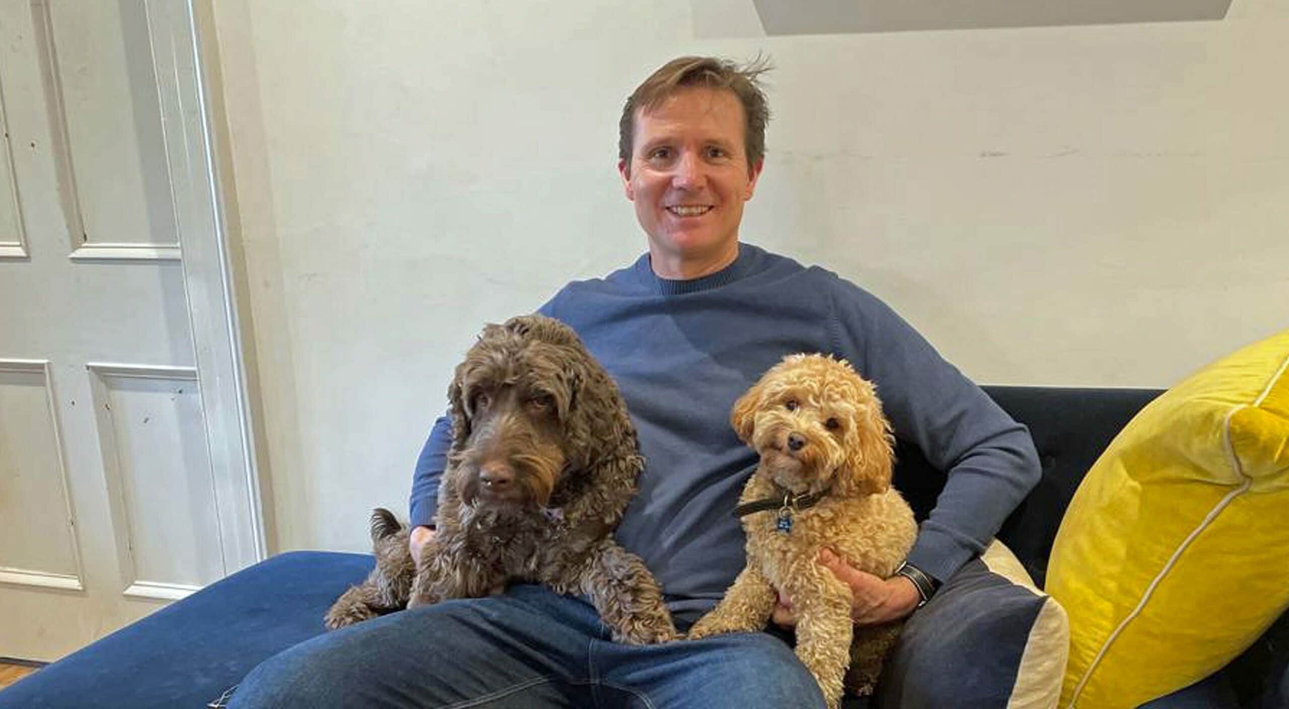 roger black at home with his dogs scaled e1643231754147