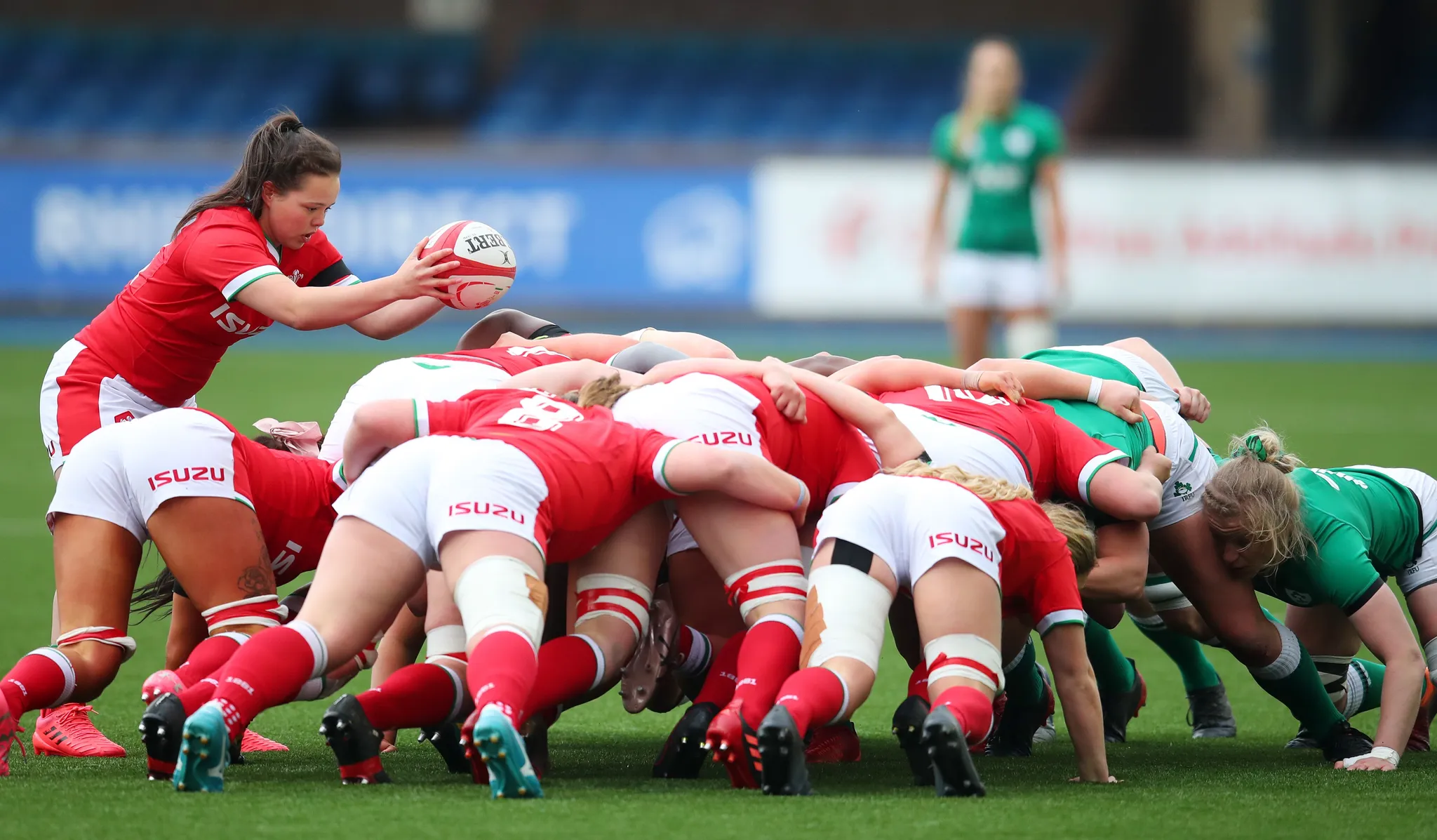 women in rugby scrum
