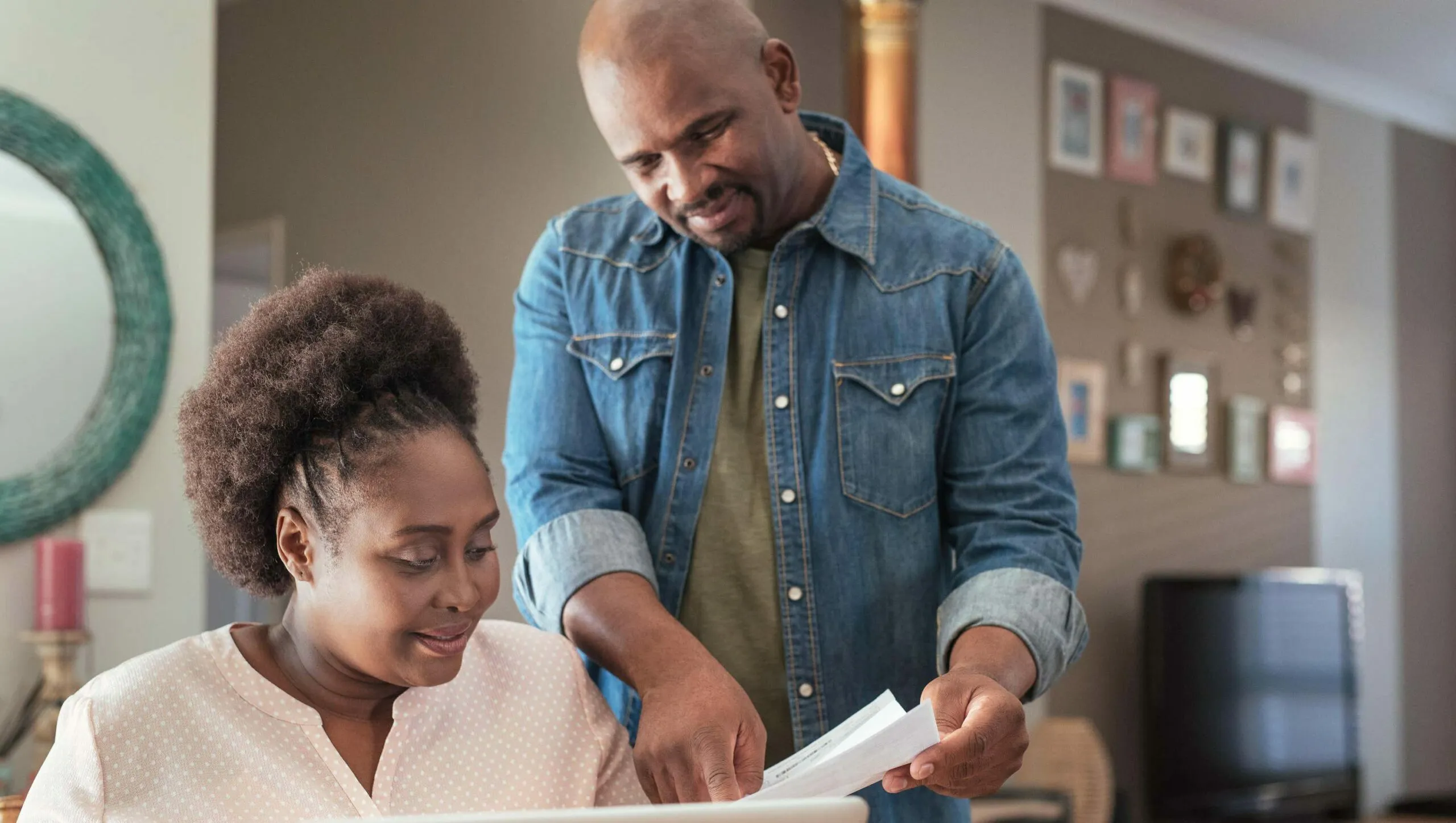 couple looking over paperwork scaled e1645121163668