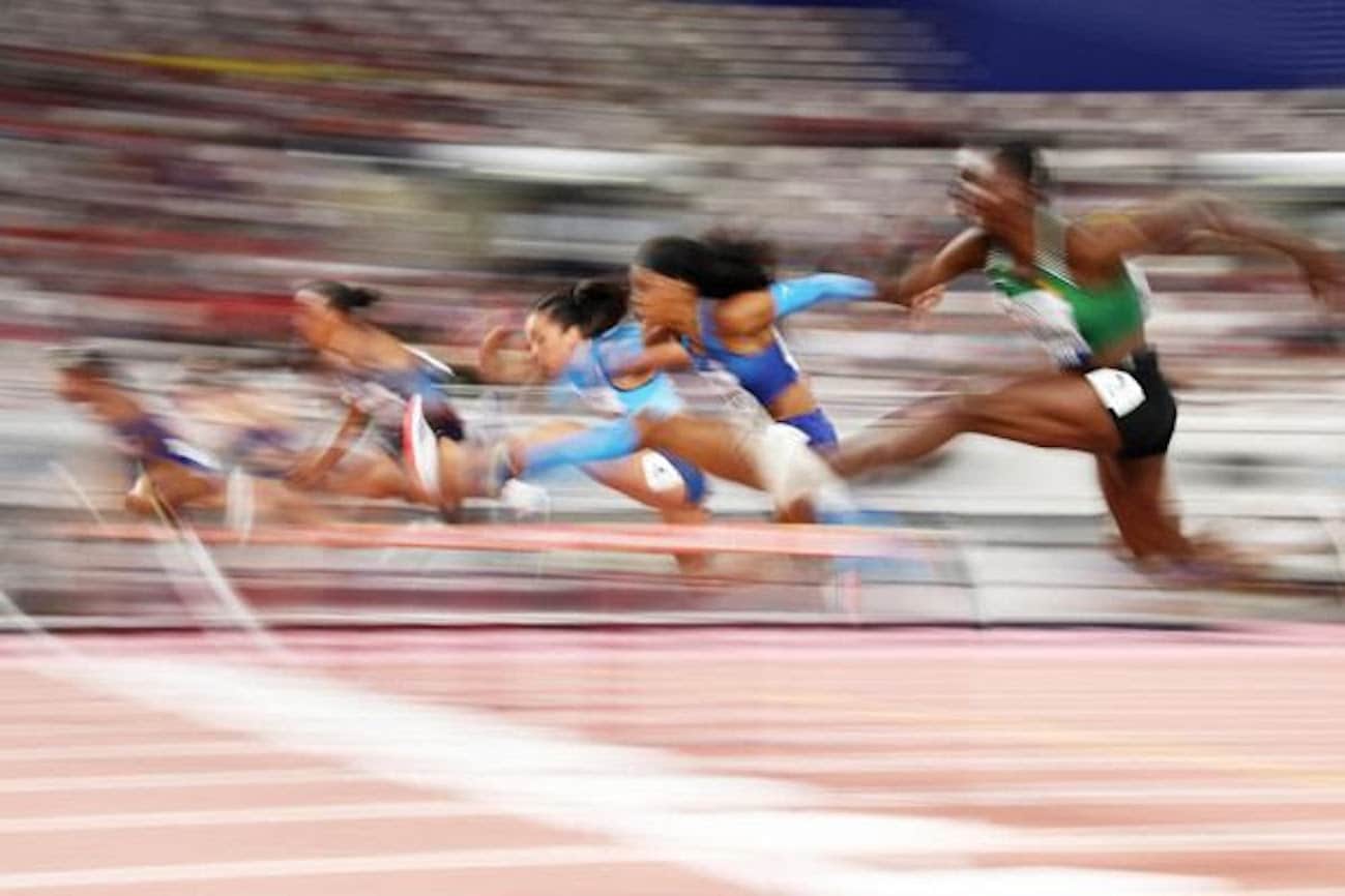 athletes blurred over finish line