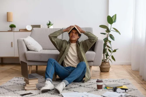 teen with book on head scaled