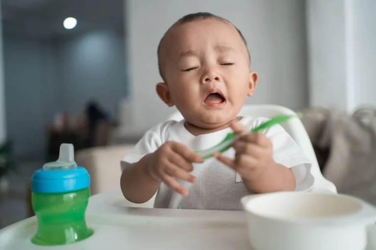 baby looks to sneeze