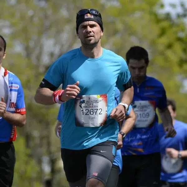 Matthias dandois and cyril despres run during the wings for life world run in hennebont france on may 4 2014 scaled e1652000226142