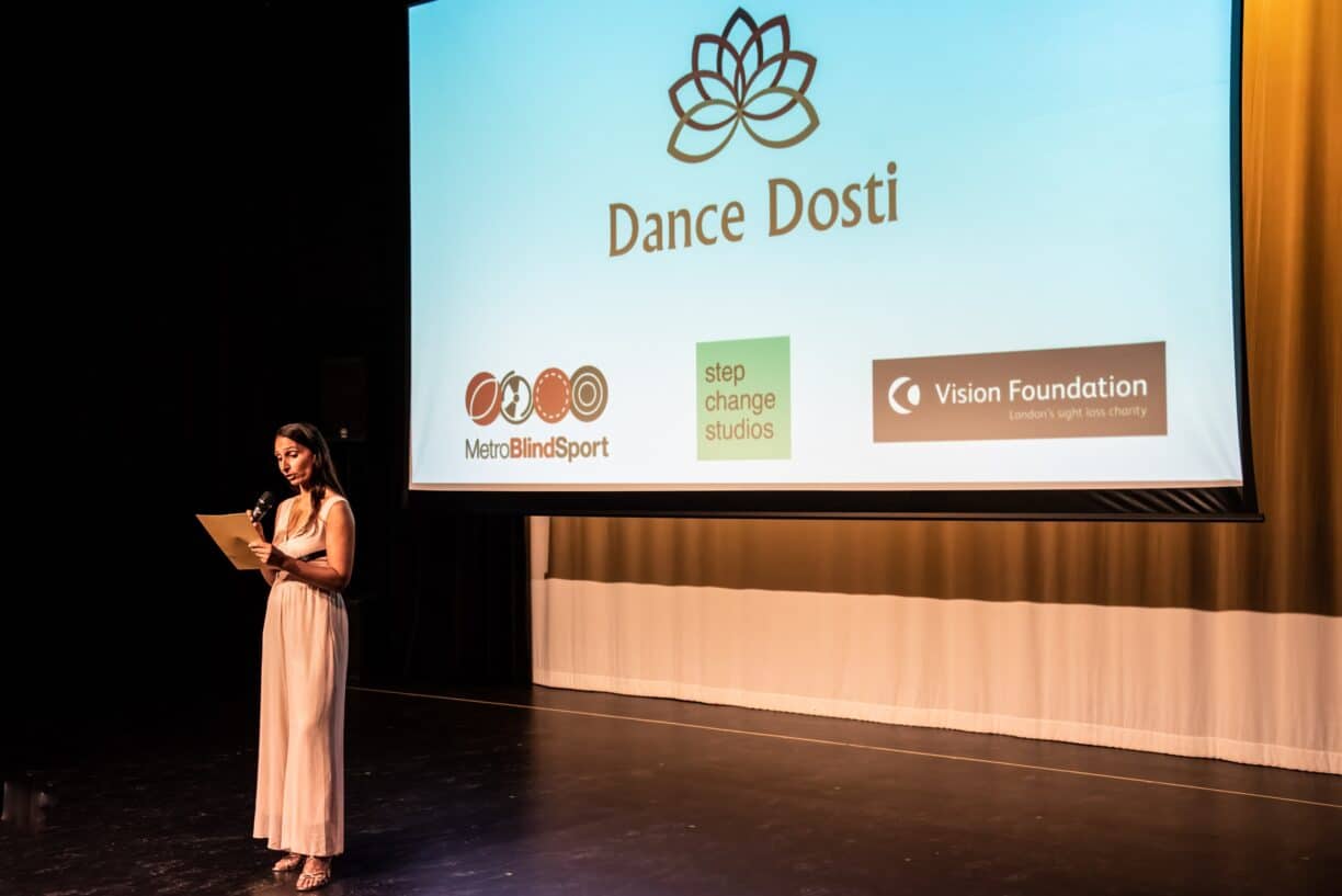 Rashmi becker mbe speaking at dance dosti showcase event