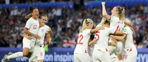 england womens footballers celebrate