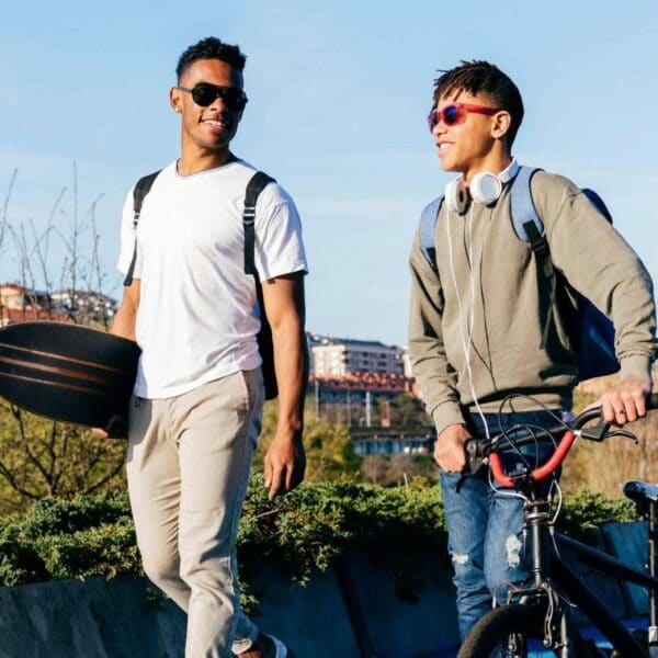 two guys with bike and skateboard scaled e1651680742443