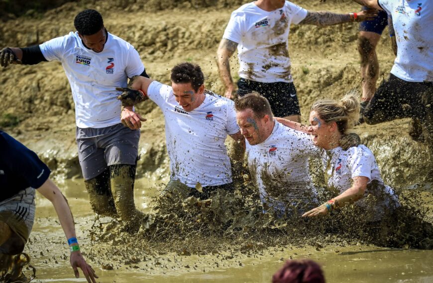 tough mudder athletes in mud