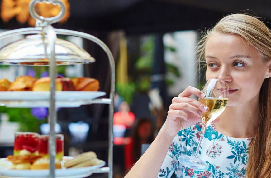 young woman enjoying afternoon tea