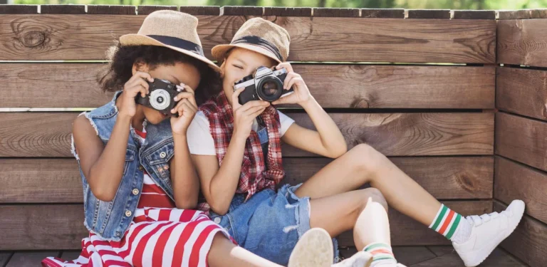 children play with cameras scaled