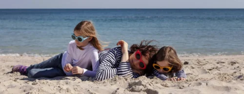 mother and child on beach