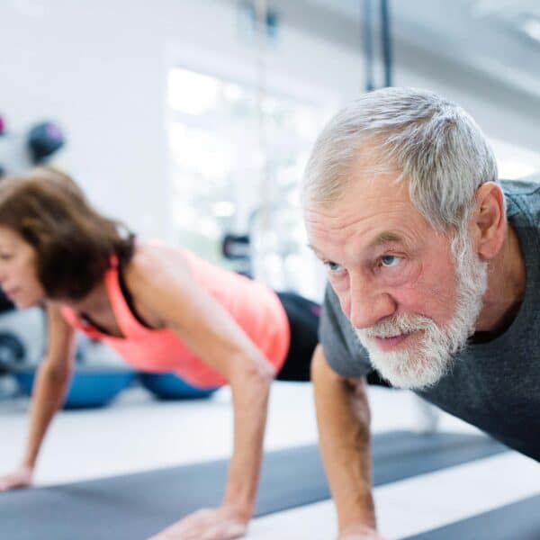 older couple do pushups