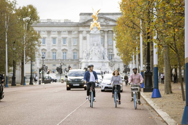 cyclists on swapfiet bikes the mall london