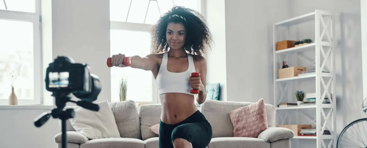 fit woman worksout in front of camera