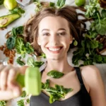 woman surrounded by various healthy food lying on the floor
