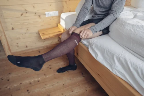 Person wearing CEP RECOVERY SOCK