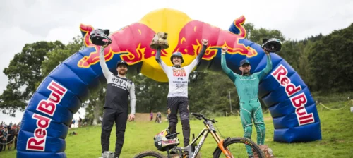 Jackson Goldstone, Joe Smith and Taylor Vernon celebrate during Red Bull Hardline at Dinas Mawddwy, Wales on September 11, 2022