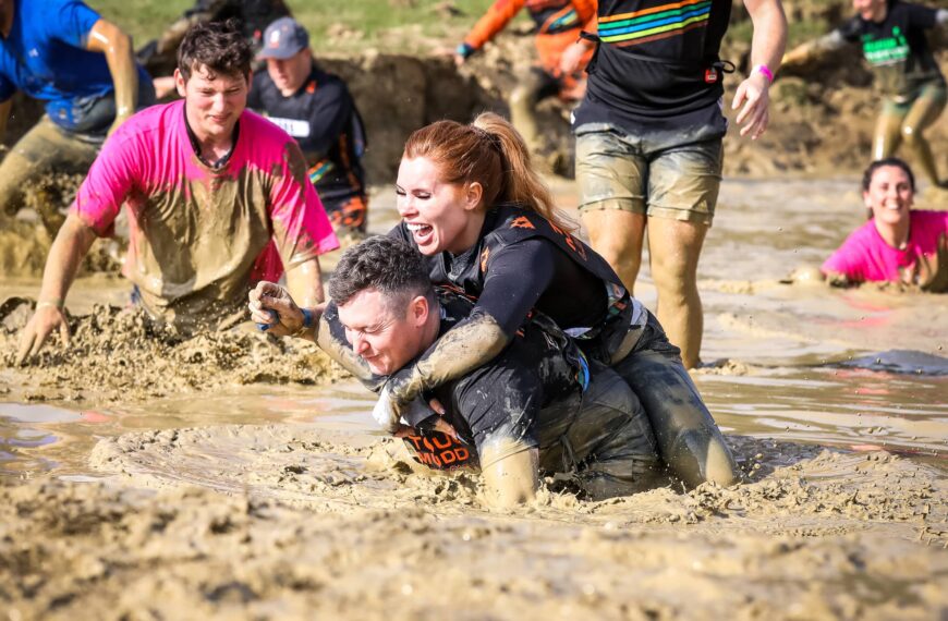 tough mudder couple in mud
