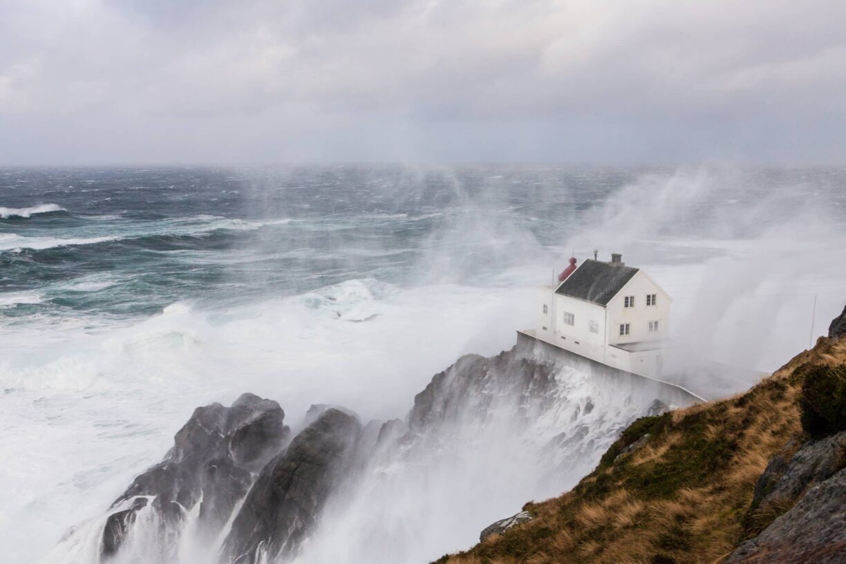 Kråkenes Fyr in stormy weather brings a spectacular feeling